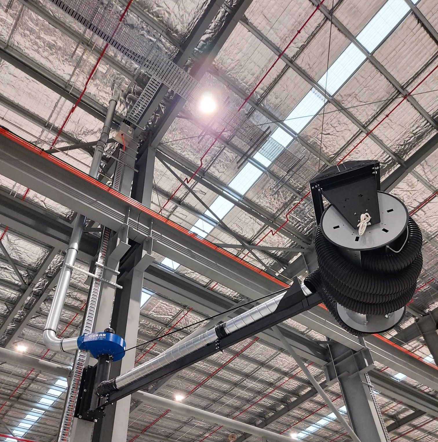 Roof mounted Garage Reels, Fume Booms and Fume Fans can be installed to cover wide areas of large hangers or workshops.